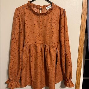 Elegant Rust Blouse with Speckled Design